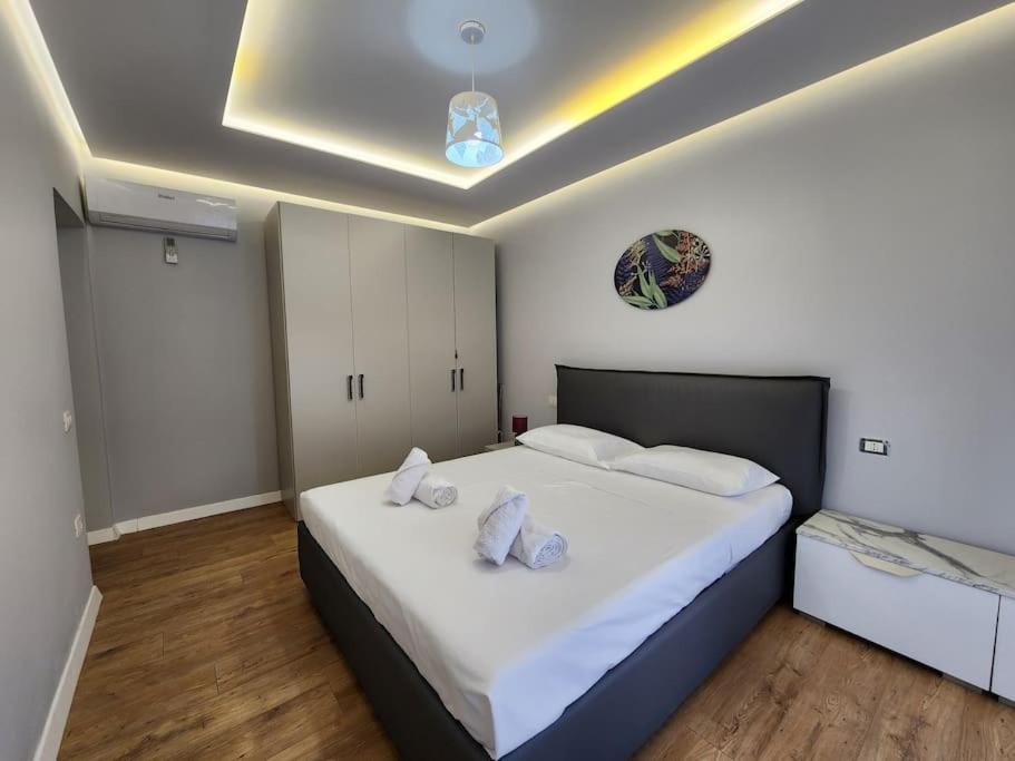 Cozy Midtown In Апартаменти Тирана